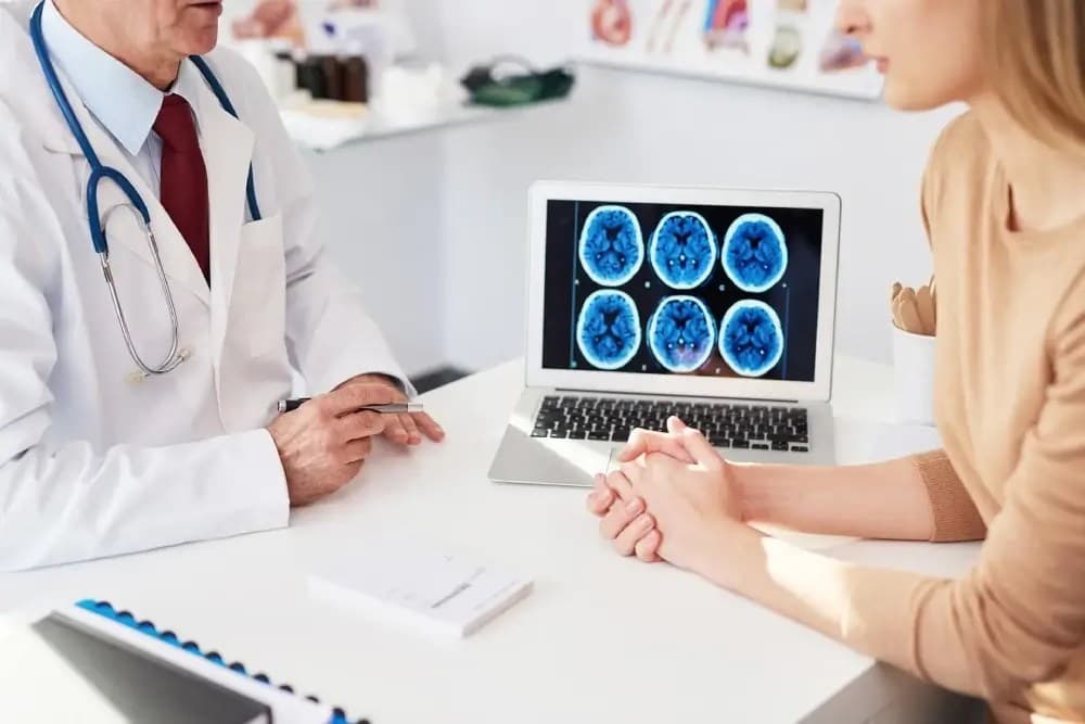 Neurosurgery consultation — specialist evaluation with brain imaging